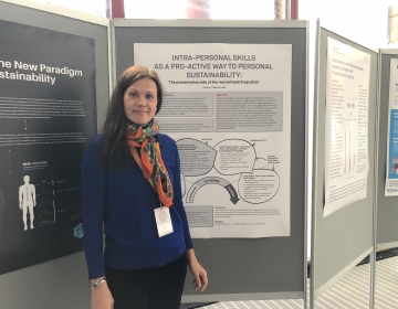 Emotion Revolution in Bergen, Norway 04/2018. Dr. Helena Lass with her poster. Photo by Ingvar Villido